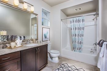 Furnished bathroom with garden style tub